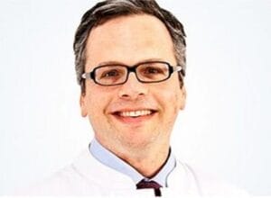 Porträt des Autors Prof. Dr. med. Christos Haritoglou, Leitender Arzt der Augenklinik Herzog Carl Theodor in München